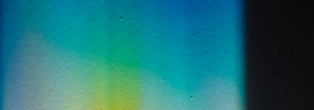 Imagem abstrata, com textura e cores gradientes entre verde e azul
